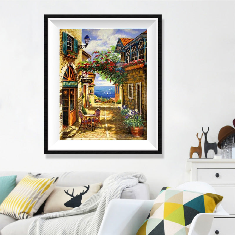 French Riviera Alley Diamond Painting Kit – Stone Lane Restaurant with Bougainvillea Arch & Mediterranean Sea View JX83
